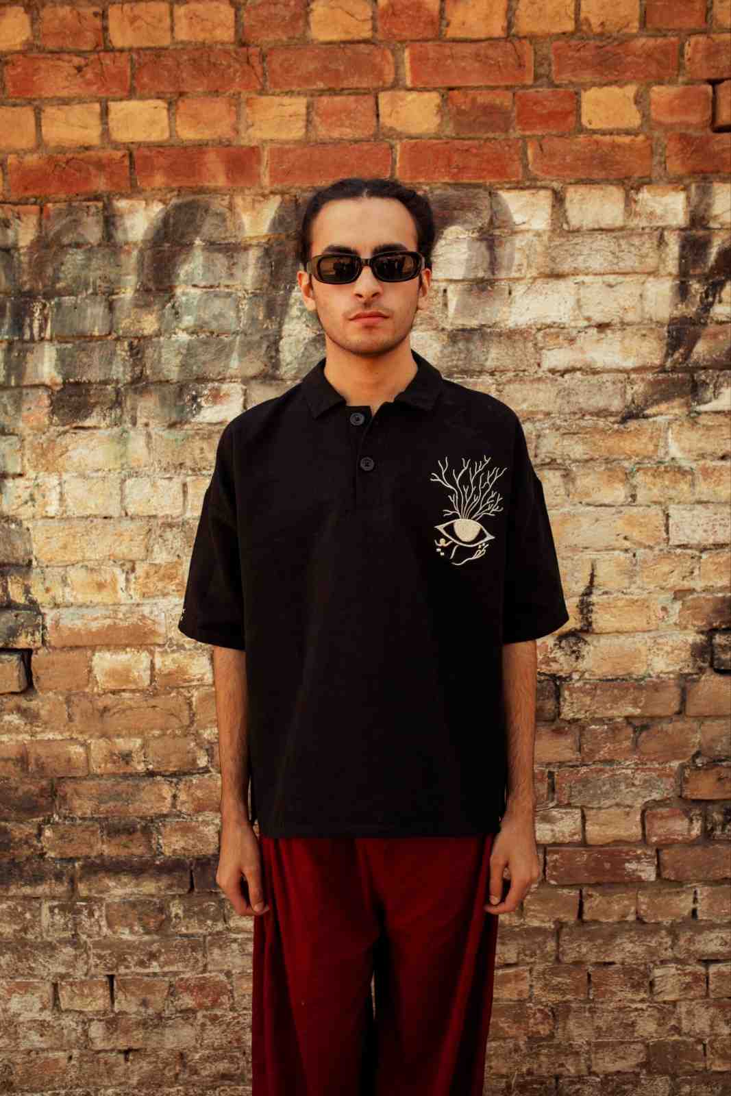 Hand Woven Bleeding Eyes Polo – Black