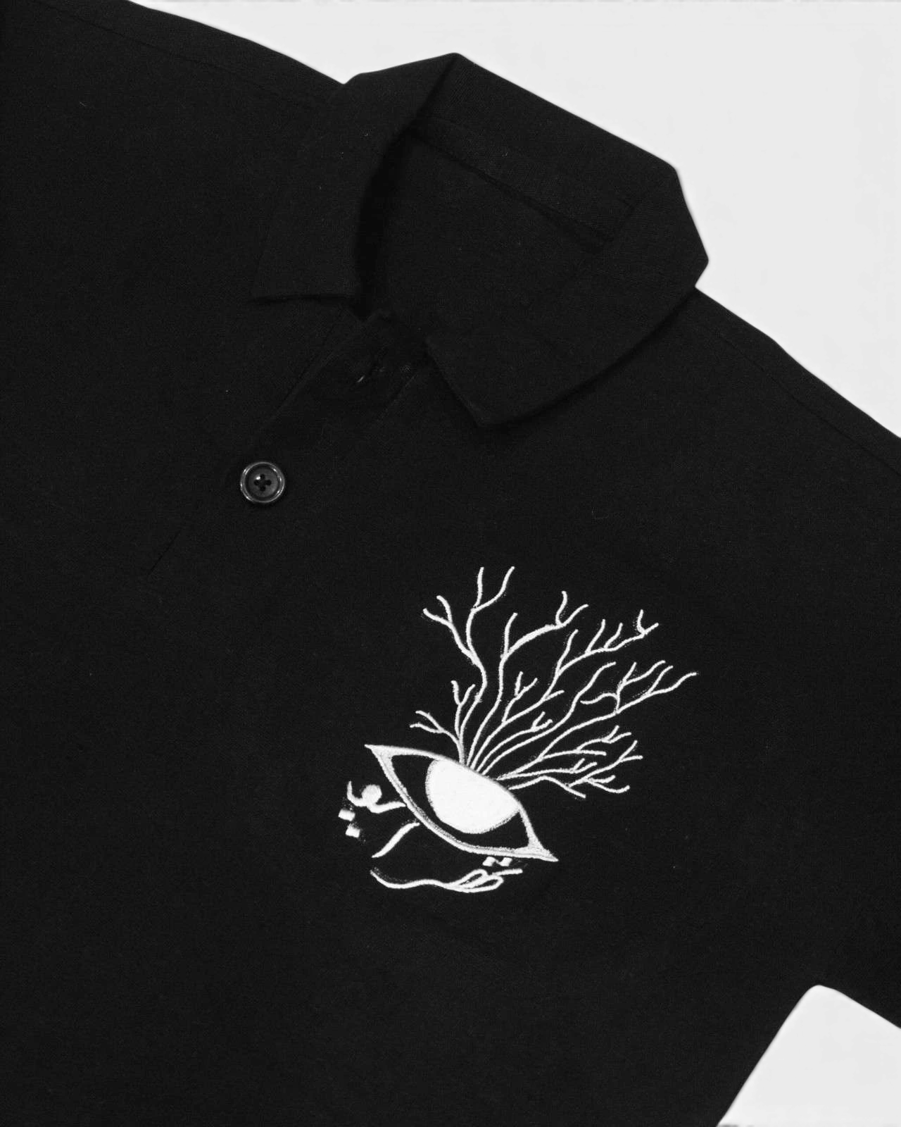 Hand Woven Bleeding Eyes Polo – Black