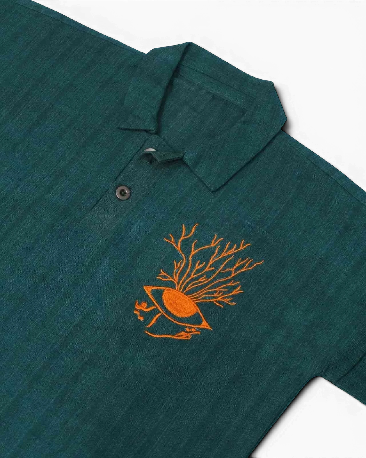 Hand Woven Bleeding Eyes Polo – Teal